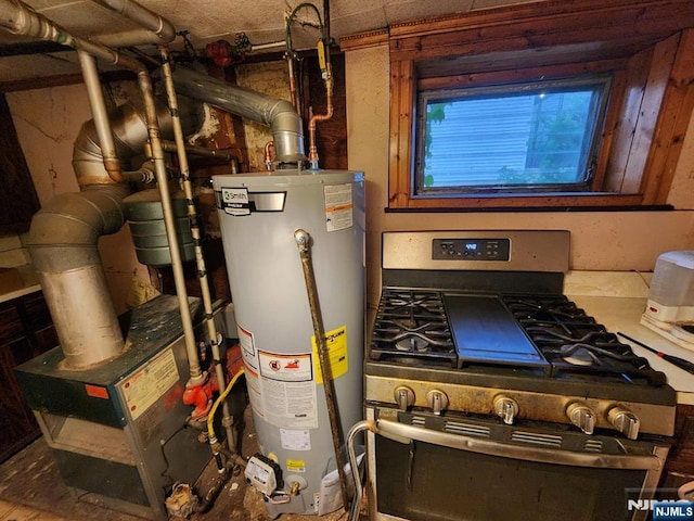 4311 Cottage Ave, North Bergen, NJ 07047 - utility room with water heater and a heating unit