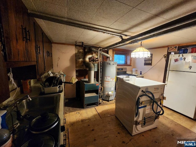 4311 Cottage Ave, North Bergen, NJ 07047 - basement with freestanding refrigerator and water heater