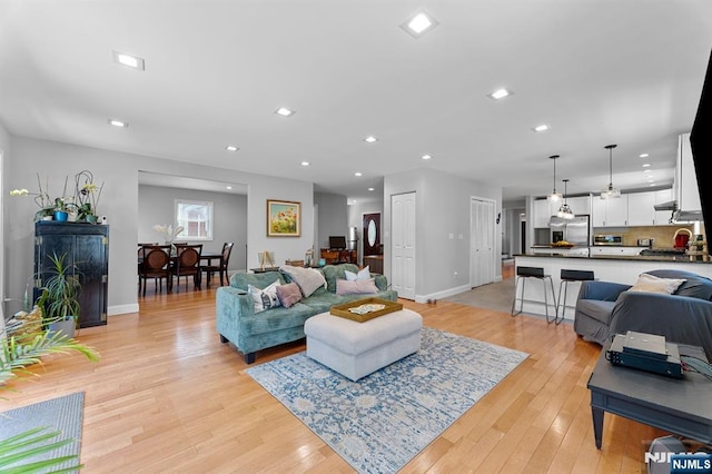 203 Central Ave, Bogota, NJ 07603 - living area featuring light wood-style flooring and recessed lighting