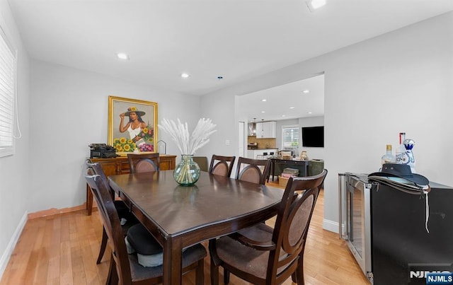 203 Central Ave, Bogota, NJ 07603 - dining area with light wood finished floors and recessed lighting