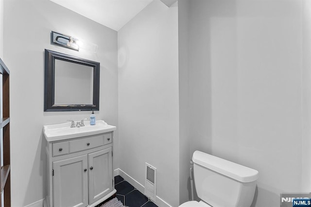 203 Central Ave, Bogota, NJ 07603 - half bath with vanity and tile patterned floors