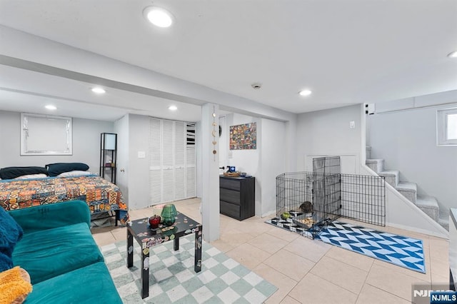 203 Central Ave, Bogota, NJ 07603 - living area with light tile patterned floors, recessed lighting, and stairway
