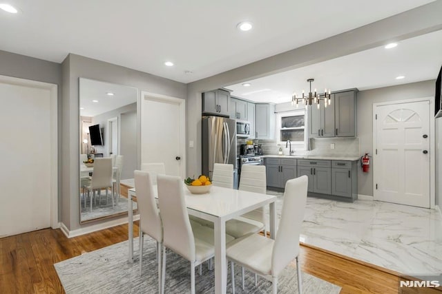 9 Westervelt Pl, Irvington, NJ 07111 - dining space with a chandelier and recessed lighting
