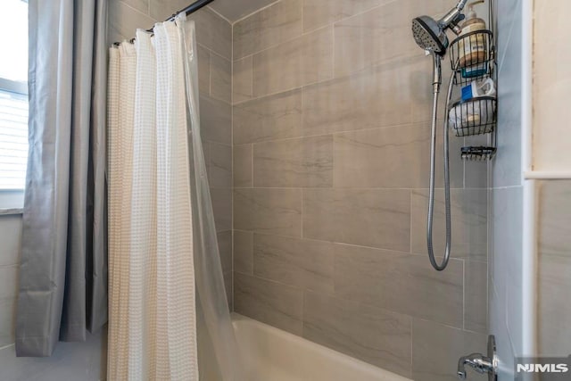9 Westervelt Pl, Irvington, NJ 07111 - bathroom featuring shower / bath combo with shower curtain