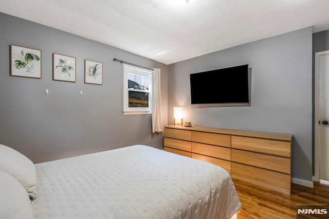 9 Westervelt Pl, Irvington, NJ 07111 - bedroom with wood finished floors and baseboards