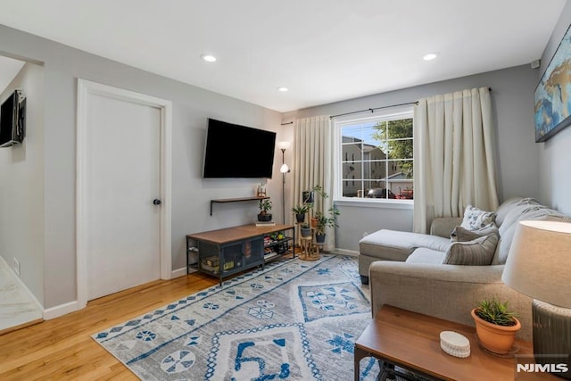 9 Westervelt Pl, Irvington, NJ 07111 - living area with wood finished floors and recessed lighting