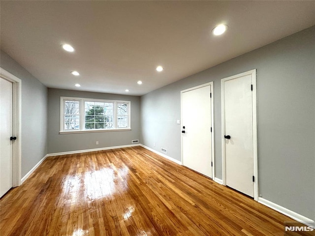 9 Westervelt Pl, Irvington, NJ 07111 - empty room featuring recessed lighting and hardwood / wood-style floors