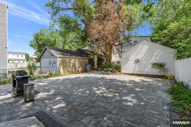 9 Westervelt Pl, Irvington, NJ 07111 - view of patio / terrace with area for grilling and an outdoor structure