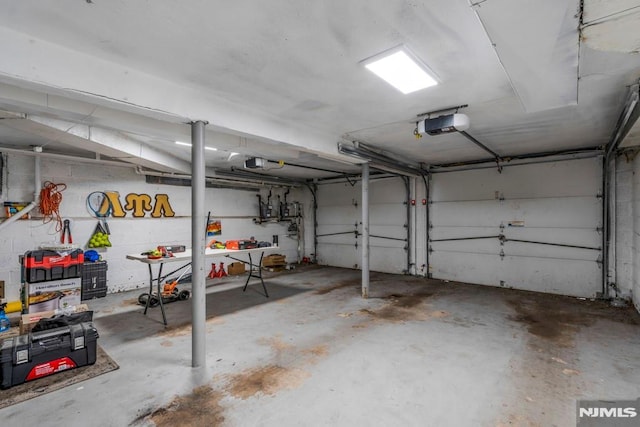 9 Westervelt Pl, Irvington, NJ 07111 - garage featuring a garage door opener