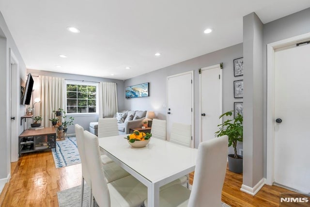 9 Westervelt Pl, Irvington, NJ 07111 - dining room with light wood-style floors and recessed lighting