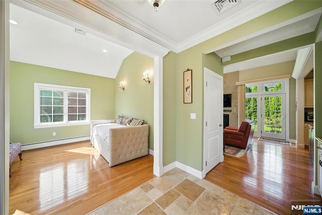 6 Highland Ave, Demarest, NJ 07627 - bedroom with baseboard heating, multiple windows, ornamental molding, light wood-style floors, and vaulted ceiling