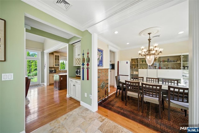 6 Highland Ave, Demarest, NJ 07627 - dining area featuring ornamental molding, a chandelier, light wood-type flooring, and recessed lighting