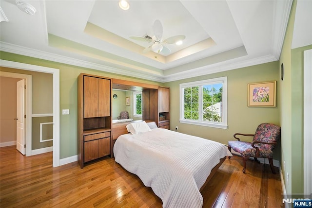 6 Highland Ave, Demarest, NJ 07627 - bedroom with light wood-style floors, a raised ceiling, and ceiling fan