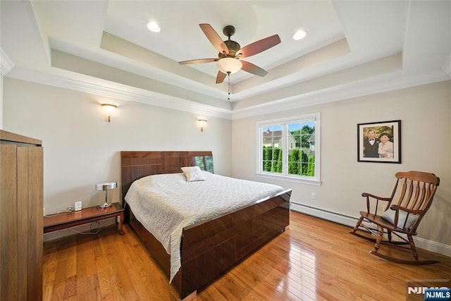 6 Highland Ave, Demarest, NJ 07627 - bedroom with a tray ceiling, wood finished floors, and recessed lighting