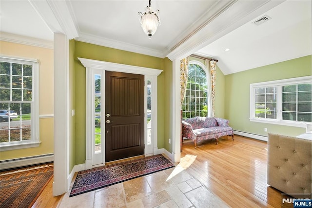 6 Highland Ave, Demarest, NJ 07627 - entrance foyer featuring baseboard heating, ornamental molding, and a chandelier