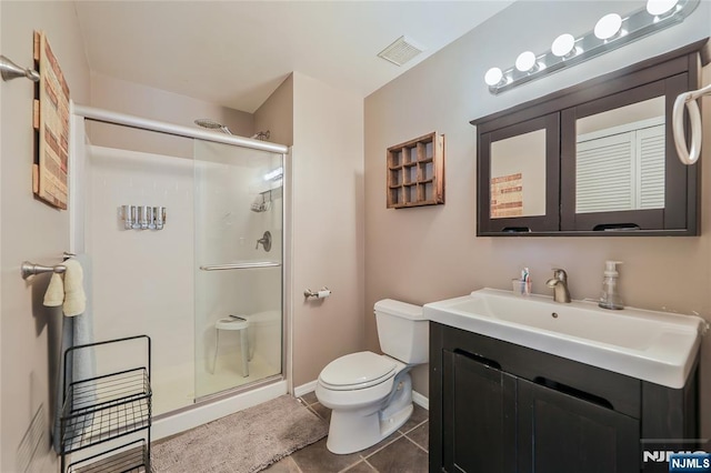 1066 Ash Dr, Mahwah, NJ 07430 - full bath featuring a stall shower, vanity, and tile patterned flooring