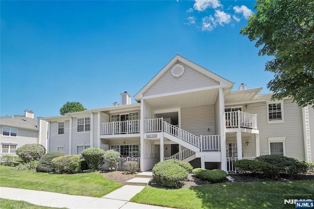 1066 Ash Dr, Mahwah, NJ 07430 - view of building exterior featuring stairs