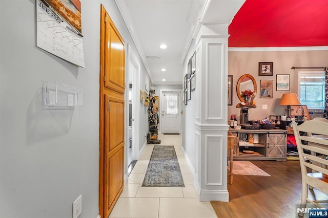 79 Newark Ave, Bloomfield, NJ 07003 - corridor with plenty of natural light, ornate columns, ornamental molding, recessed lighting, and light tile patterned floors
