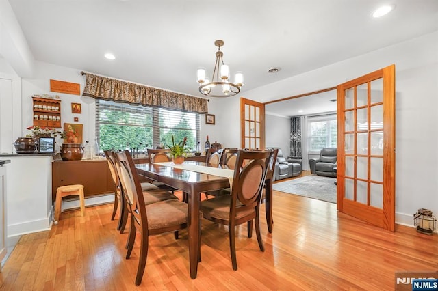 79 Newark Ave, Bloomfield, NJ 07003 - dining space featuring a chandelier, light wood-type flooring, recessed lighting, and a baseboard heating unit