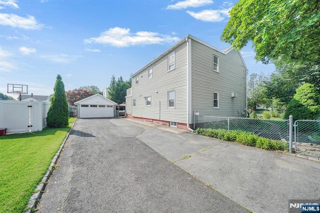 79 Newark Ave, Bloomfield, NJ 07003 - view of side of home featuring a detached garage and an outbuilding
