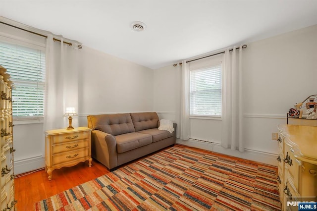 79 Newark Ave, Bloomfield, NJ 07003 - living room with healthy amount of natural light and wood finished floors