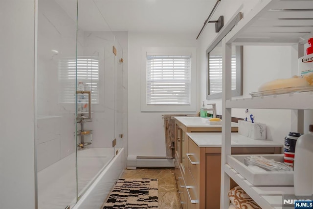 79 Newark Ave, Bloomfield, NJ 07003 - bathroom featuring a baseboard radiator, enclosed tub / shower combo, and vanity