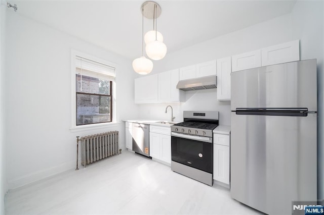 1100 83rd St Unit 301, North Bergen, NJ 07047 - kitchen featuring stainless steel appliances, radiator heating unit, range hood, light countertops, and white cabinets