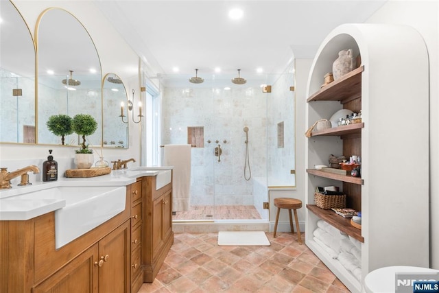 216 8th St, Cresskill, NJ 07626 - bathroom with a shower stall, double vanity, and recessed lighting