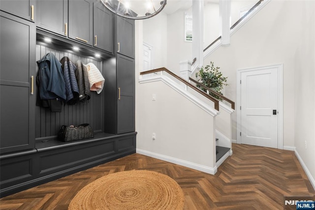 216 8th St, Cresskill, NJ 07626 - mudroom featuring baseboards and a chandelier