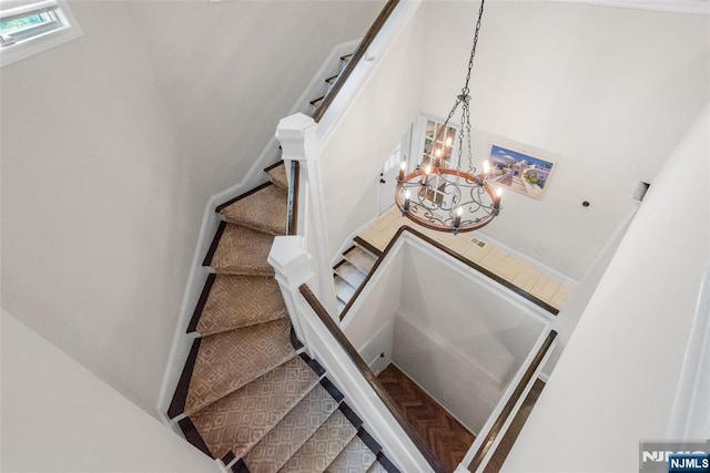 216 8th St, Cresskill, NJ 07626 - stairs with a chandelier
