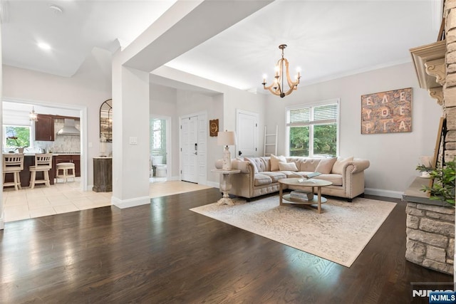 216 8th St, Cresskill, NJ 07626 - living area featuring a chandelier and light wood finished floors
