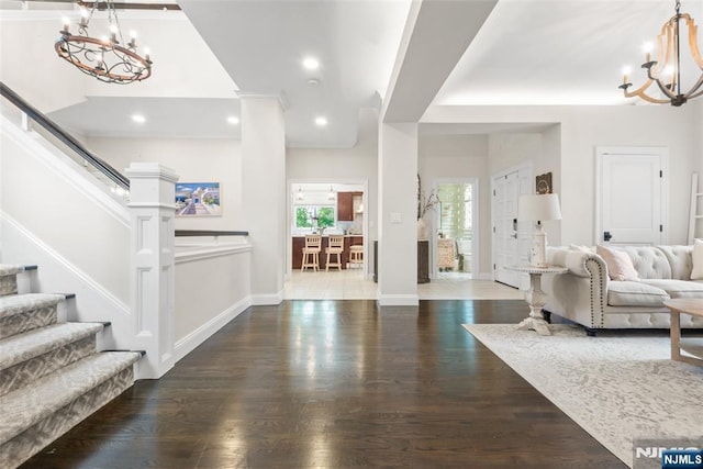 216 8th St, Cresskill, NJ 07626 - entryway with a chandelier, stairway, wood finished floors, and recessed lighting
