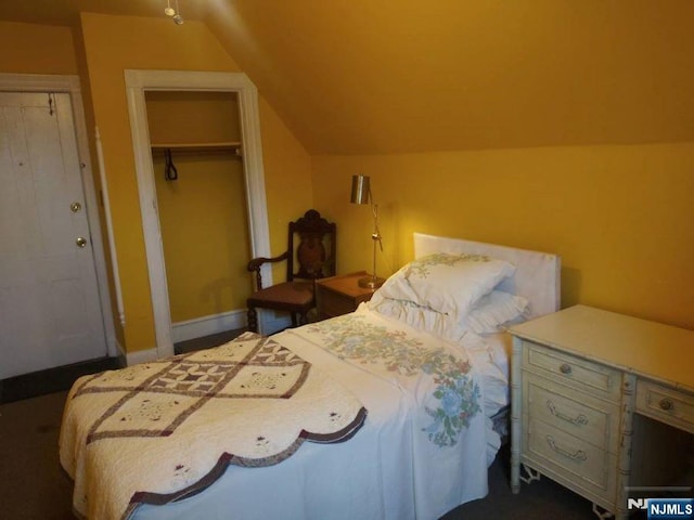 17 48th St, Weehawken, NJ 07086 - bedroom with lofted ceiling and a closet
