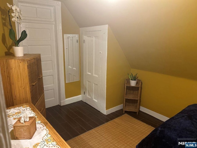 17 48th St, Weehawken, NJ 07086 - bedroom featuring vaulted ceiling and dark wood finished floors