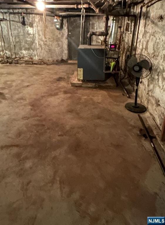 17 48th St, Weehawken, NJ 07086 - unfinished below grade area featuring gas meter and a heating unit