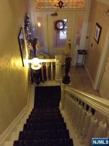 17 48th St, Weehawken, NJ 07086 - stairs with tile patterned flooring