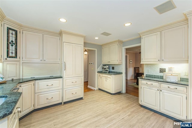 59 Green Hill Rd, Kinnelon Borough, NJ 07405 - kitchen with cream cabinets, light wood-type flooring, crown molding, tasteful backsplash, and recessed lighting