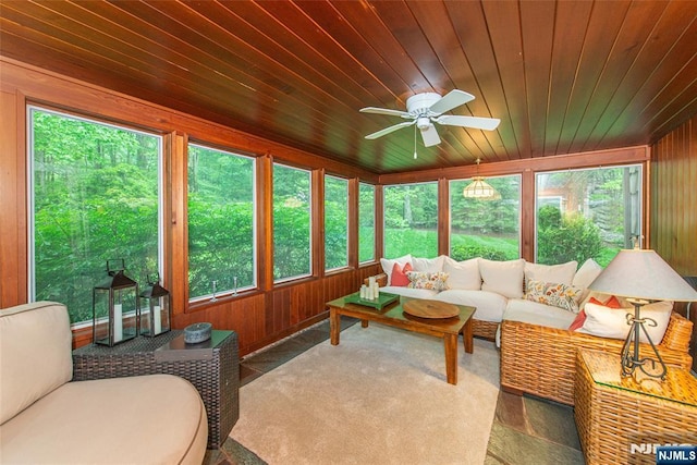 59 Green Hill Rd, Kinnelon Borough, NJ 07405 - living area with healthy amount of natural light, a ceiling fan, wooden ceiling, and wooden walls
