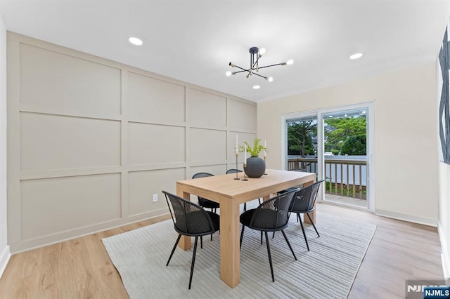 8 Marianne Ter, Secaucus, NJ 07094 - dining space with a chandelier, a decorative wall, light wood-style floors, and recessed lighting