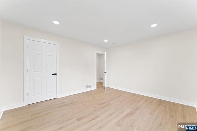 8 Marianne Ter, Secaucus, NJ 07094 - spare room with light wood finished floors and recessed lighting
