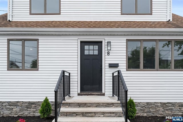 8 Marianne Ter, Secaucus, NJ 07094 - property entrance featuring a shingled roof