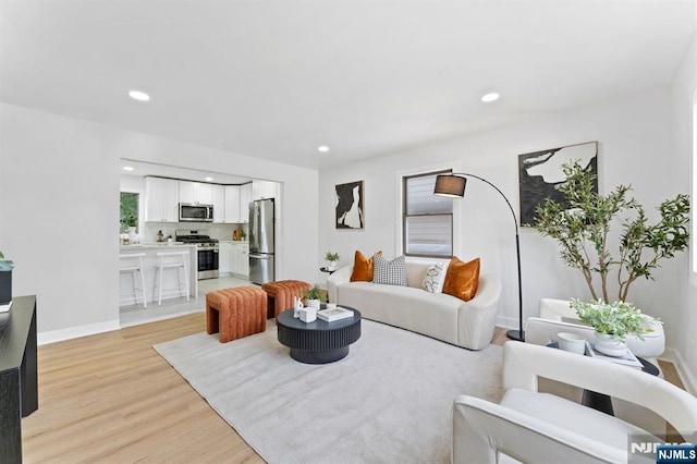 8 Marianne Ter, Secaucus, NJ 07094 - living area featuring light wood-style floors and recessed lighting