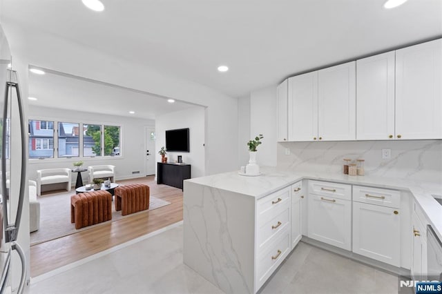8 Marianne Ter, Secaucus, NJ 07094 - kitchen with open floor plan, white cabinetry, recessed lighting, and a peninsula