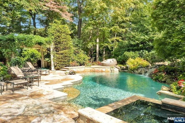 307 Freemans Ln, Franklin Lakes, NJ 07417 - view of pool featuring a patio and a pool with connected hot tub