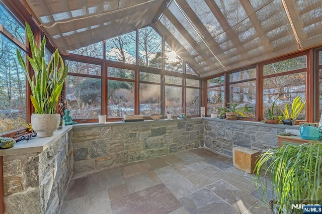 307 Freemans Ln, Franklin Lakes, NJ 07417 - unfurnished sunroom with high vaulted ceiling and stone finish floors