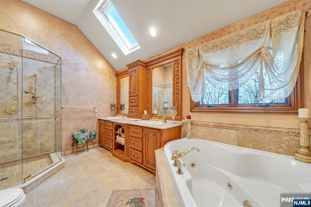 307 Freemans Ln, Franklin Lakes, NJ 07417 - bathroom with a skylight, vaulted ceiling, double vanity, a stall shower, and a whirlpool tub
