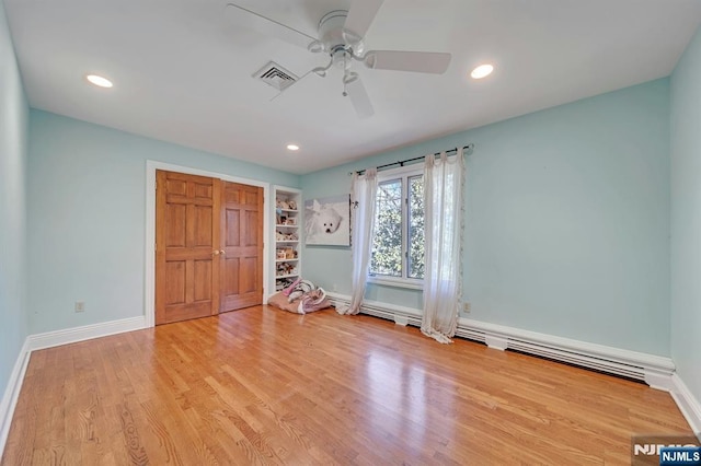 307 Freemans Ln, Franklin Lakes, NJ 07417 - unfurnished bedroom featuring wood finished floors, recessed lighting, ceiling fan, and a closet
