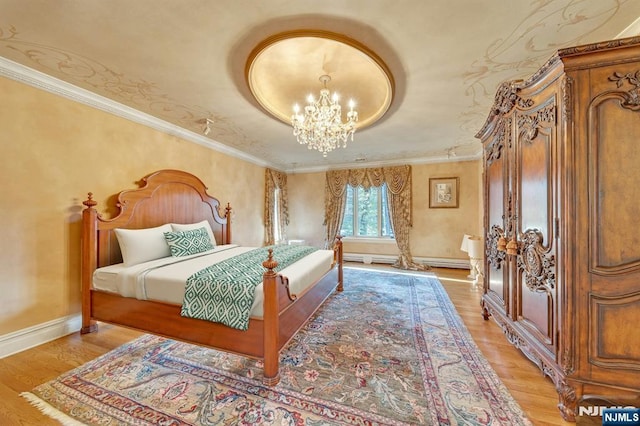 307 Freemans Ln, Franklin Lakes, NJ 07417 - bedroom with a chandelier, light wood-style floors, and ornamental molding