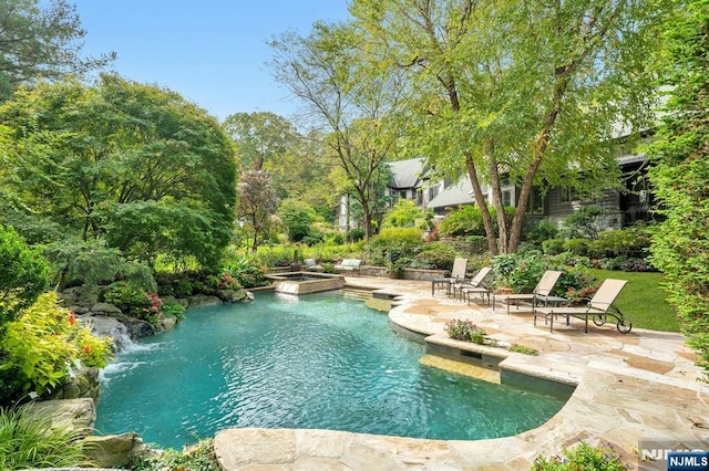 307 Freemans Ln, Franklin Lakes, NJ 07417 - view of pool featuring a patio and a pool with connected hot tub