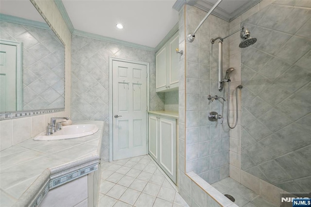 201 Oakdene Pl Unit C00E2, Cliffside Park, NJ 07010 - full bathroom with a tile shower, vanity, tile patterned floors, and crown molding